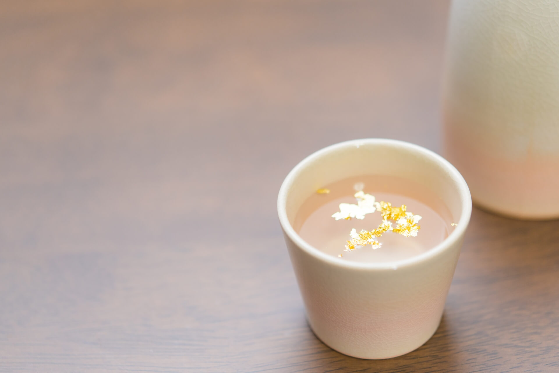the delicious way to drink sake with gold leaf